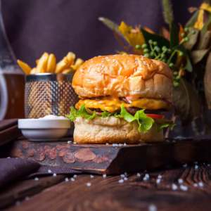 hamburger-french-fries-side-view-wood-black-background-with-decorations_176474-3657-300x300